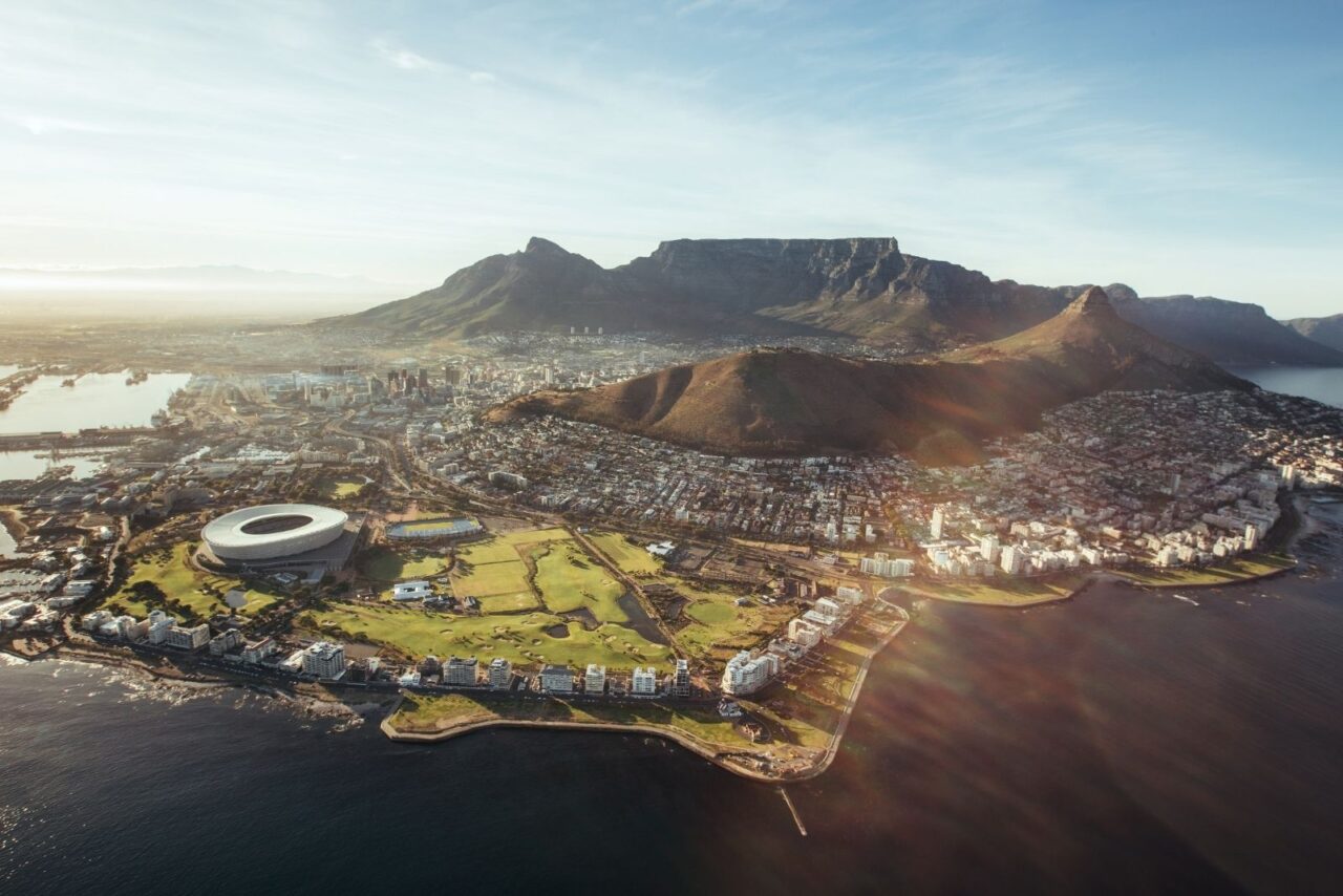 Aerial view of Cape Town from the ocean. In the distance is table mountain.