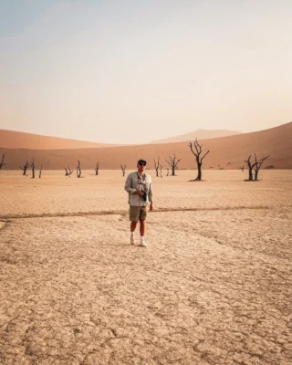Dunes you can see from space? Skeletal forests? 

Alex, our Senior Travel Specialist, recalls his favourite moments in Namibia’s Deadvlei: 

“One of my favourite images from my travels. A moment of stillness after hiking Big Daddy, one of the tallest dunes in the world. Completely in awe of the haunting beauty of Deadvlei, surrounded by ancient trees and the silent desert. A truly unforgettable afternoon.”

If you’re looking for otherworldly scenery, we recommend adding Namibia to your bucket list. Send us a DM with the word ‘NAMIBIA’ and we’ll send you our free guide. 

https://thesafariedit.com/destinations/namibia/

#namibia #deadvlei #adventure #safari #africa